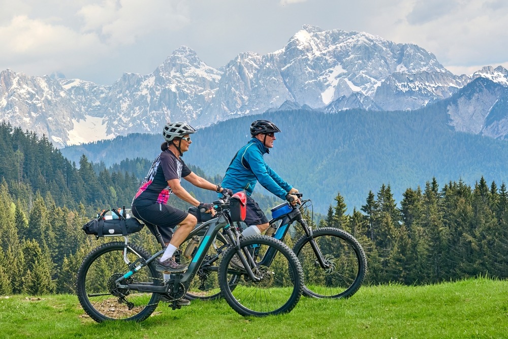 couple actively using their ebikes